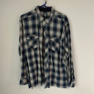 Kuhl long sleeved snap shirt. Size large